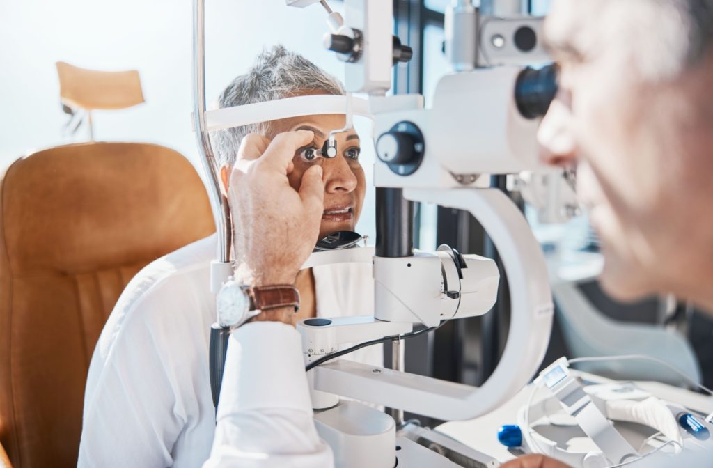 An optometrist examines their patient's ocular health during their routine eye exam to determine the cause of their night vision problems.