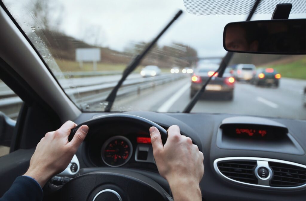A view out the front windshield of a car
